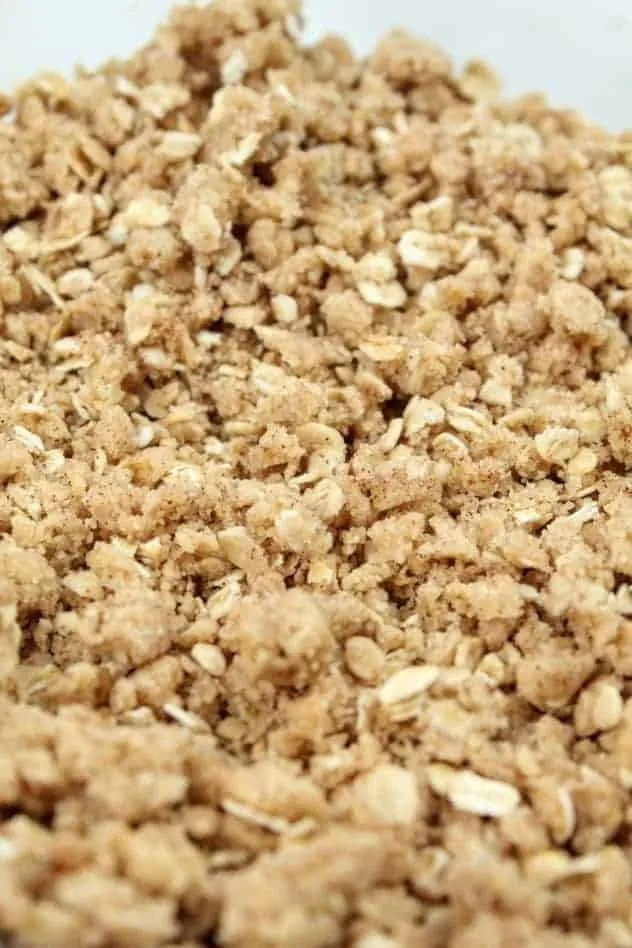 Vegan Gluten-Free Apple Crisp Process Step 1 A close up of the oatmeal topping, which includes light brown sugar, gluten-free flour, quick oats, ground cinnamon, and vegan butter.